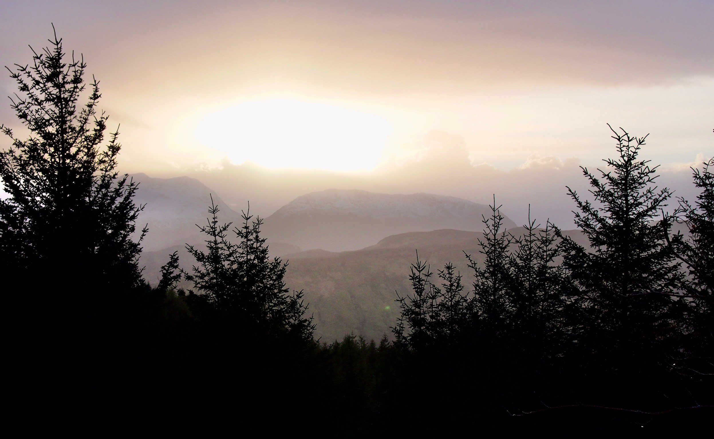 Misty Highland Sunset